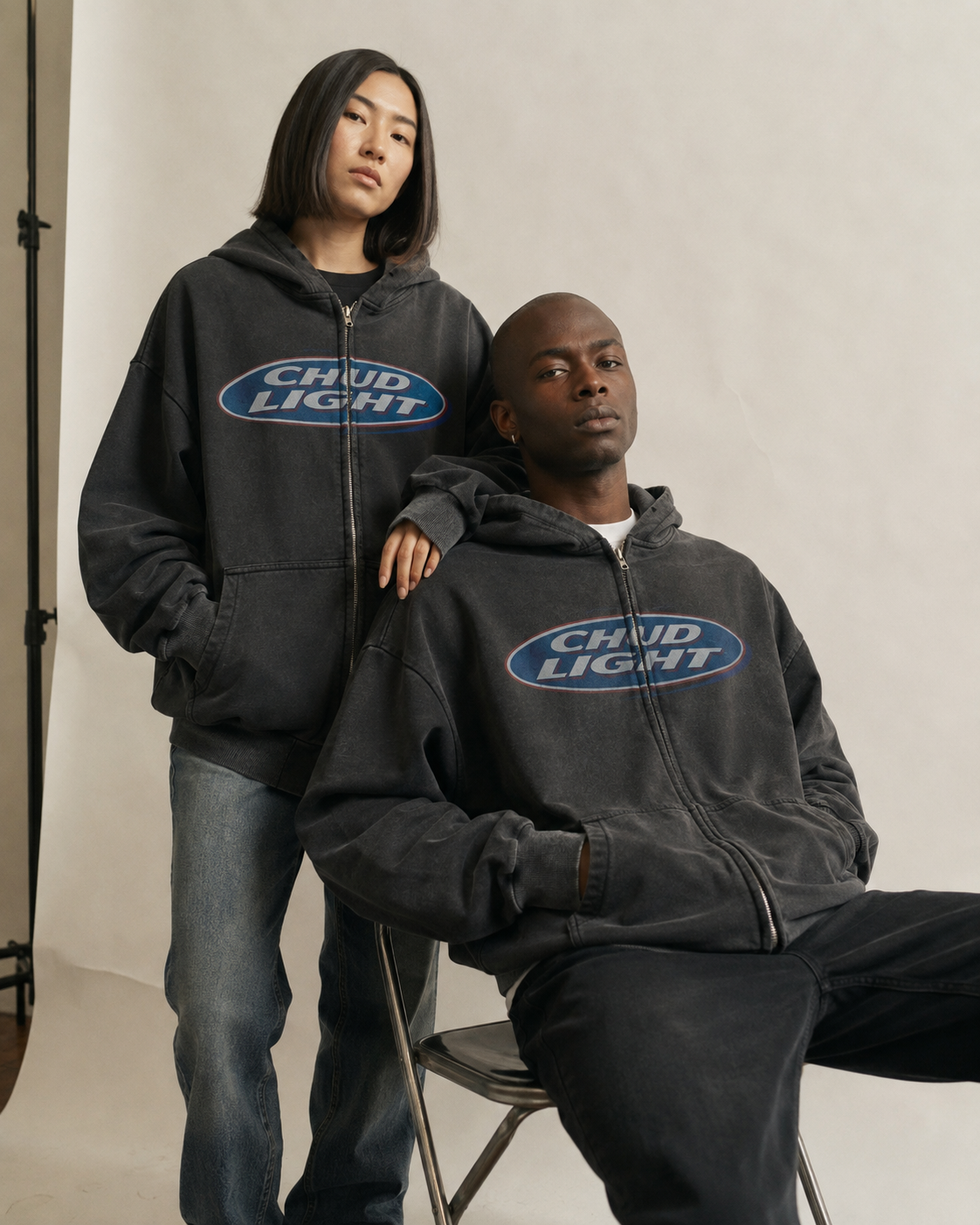 Two models wearing the Chud Light Hoodie in studio